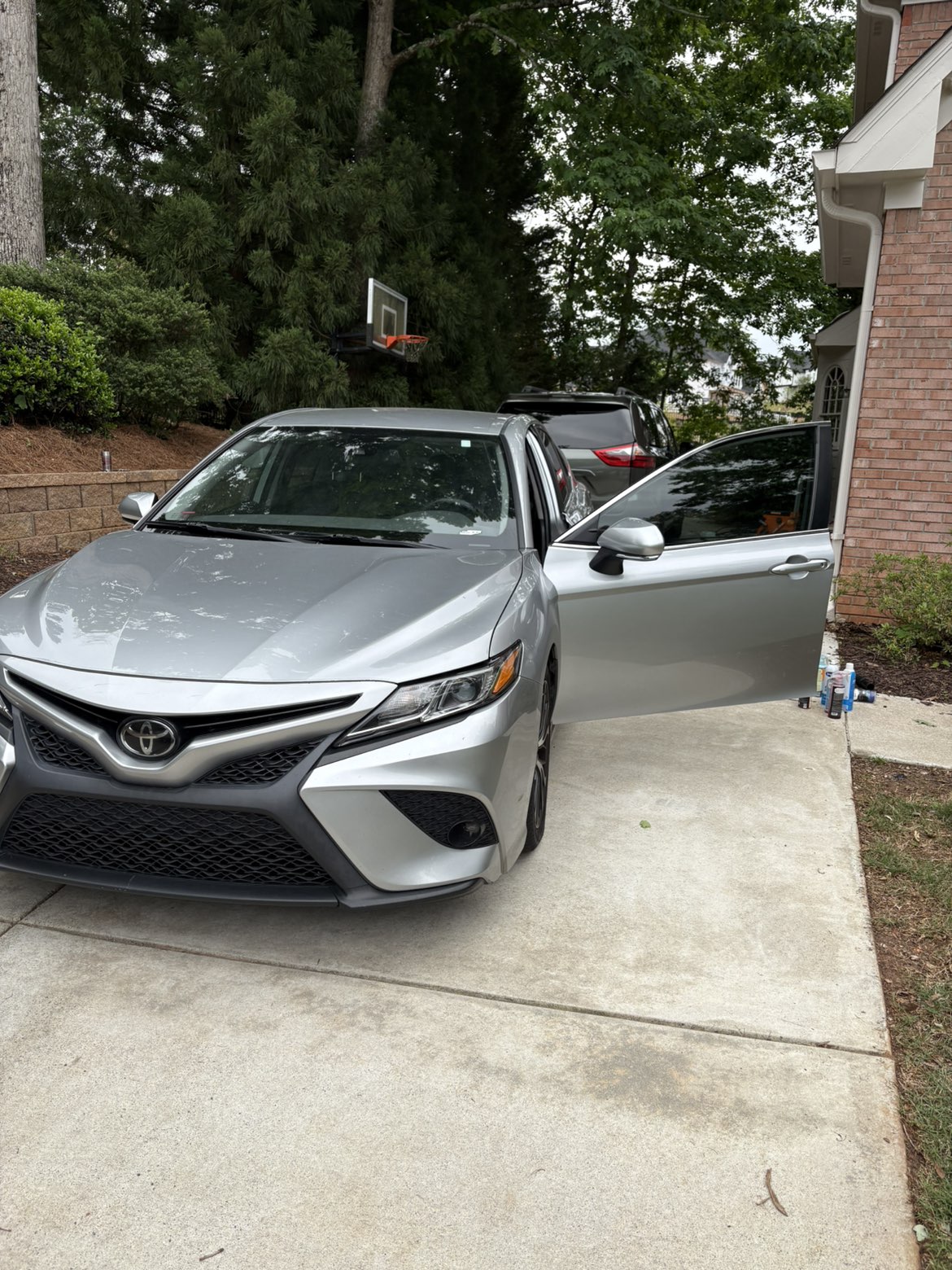 Professional mobile auto detailing full exterior detail on luxury vehicle with deep mirror-like gloss finish by Countryside Auto Detailing serving Alpharetta and Metro Atlanta