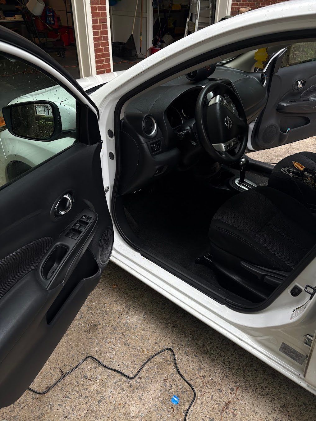 Clean sedan interior with spotless carpet and seats after a mobile detail by Countryside Auto Detailing in Alpharetta