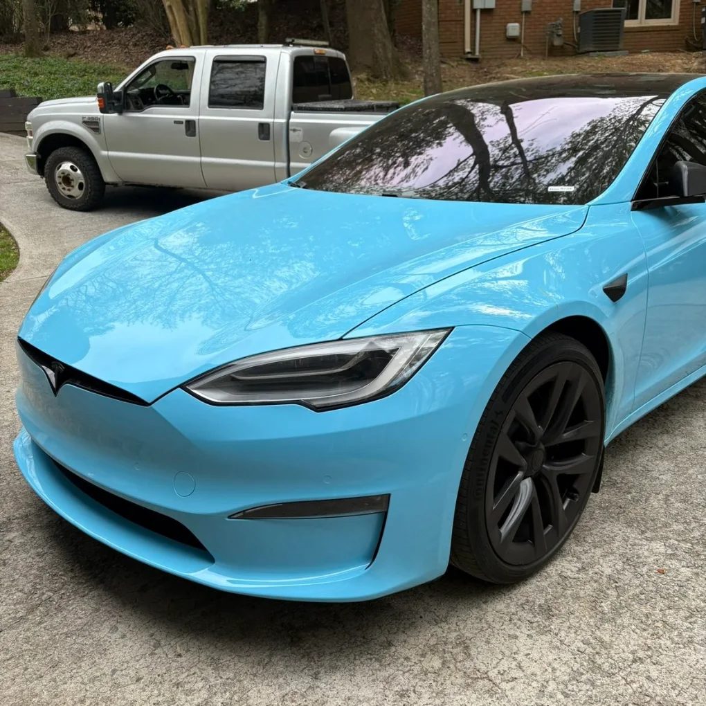 Light blue Tesla Model S with a glossy finish after an exterior detail by Countryside Auto Detailing in Metro Atlanta